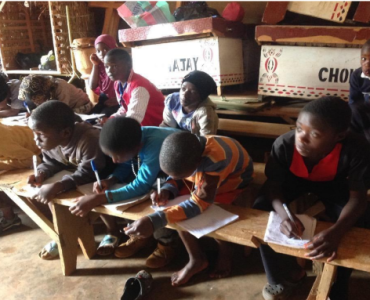 Students taking notes during class.
